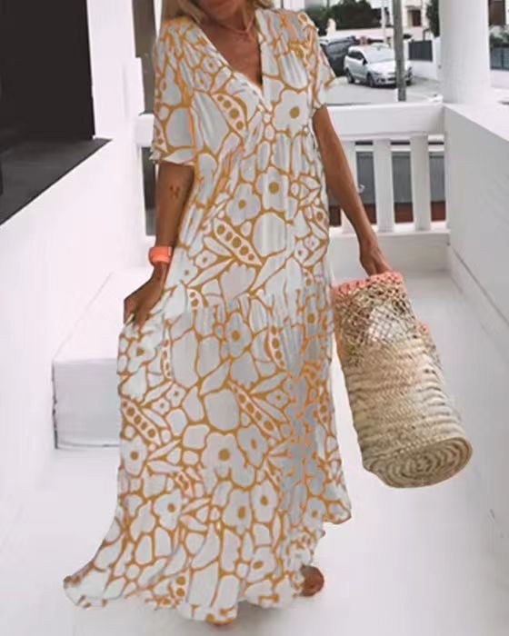 Carmen | Ibiza-style dress with a bohemian floral print