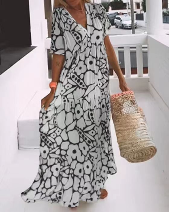Carmen | Ibiza-style dress with a bohemian floral print